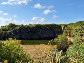 An old quarry filled with water