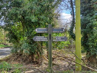 A signpost showing the distance to Watlington (6.2 miles) and 4.8 miles to Princes Risborough